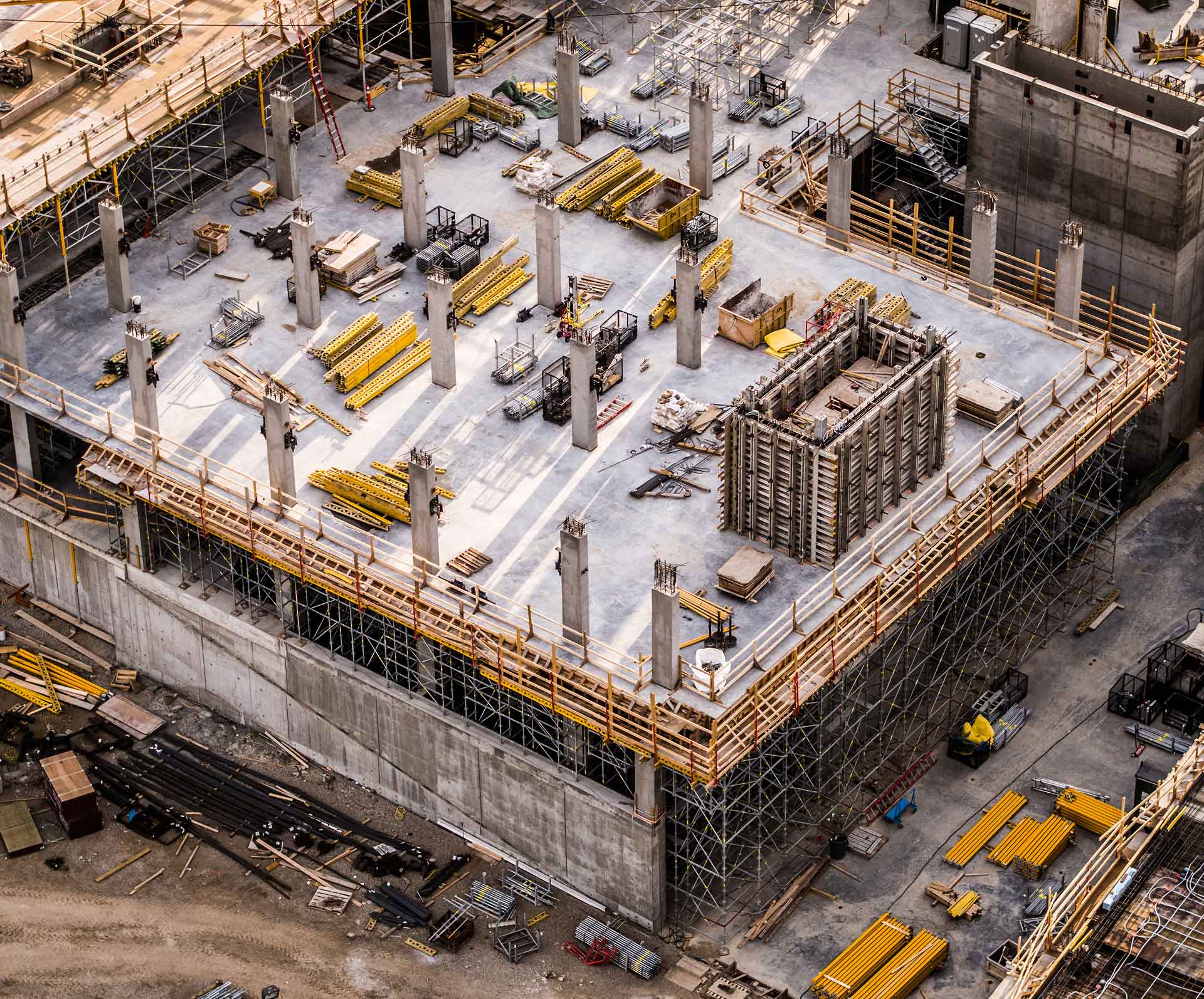 Construction worker checking electrical safety on job site
