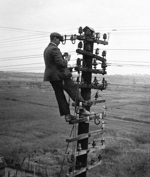 Utility Lineman using Felt Hat for Electrical Safety.