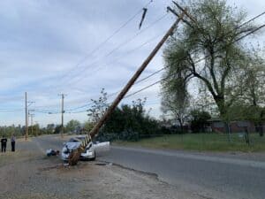 car crashes into power pole accident